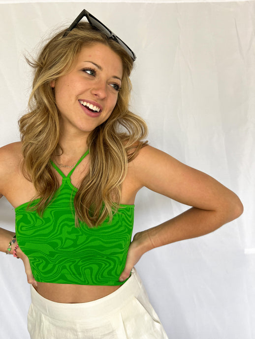 Color: Kelly Green Swirl Pattern Halter Neck One Size Fits All Super Stretchy Material Cropped Crop Top Trendy Trending Loungewear Casual NikiBiki Model is 5'6 92% Nylon, 8% Spandex